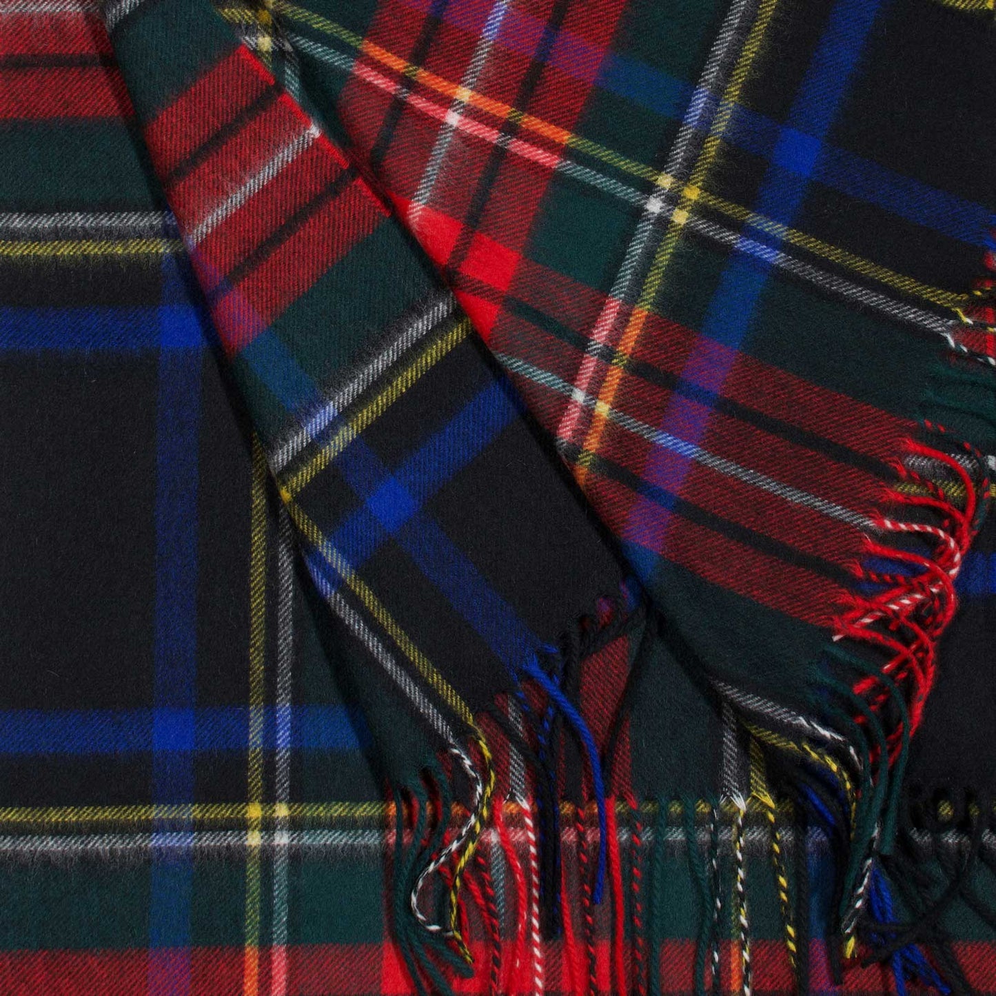 Black Stewart tartan cashmere scarf with fringe.