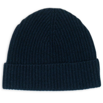 Dark blue cashmere beanie on a white background