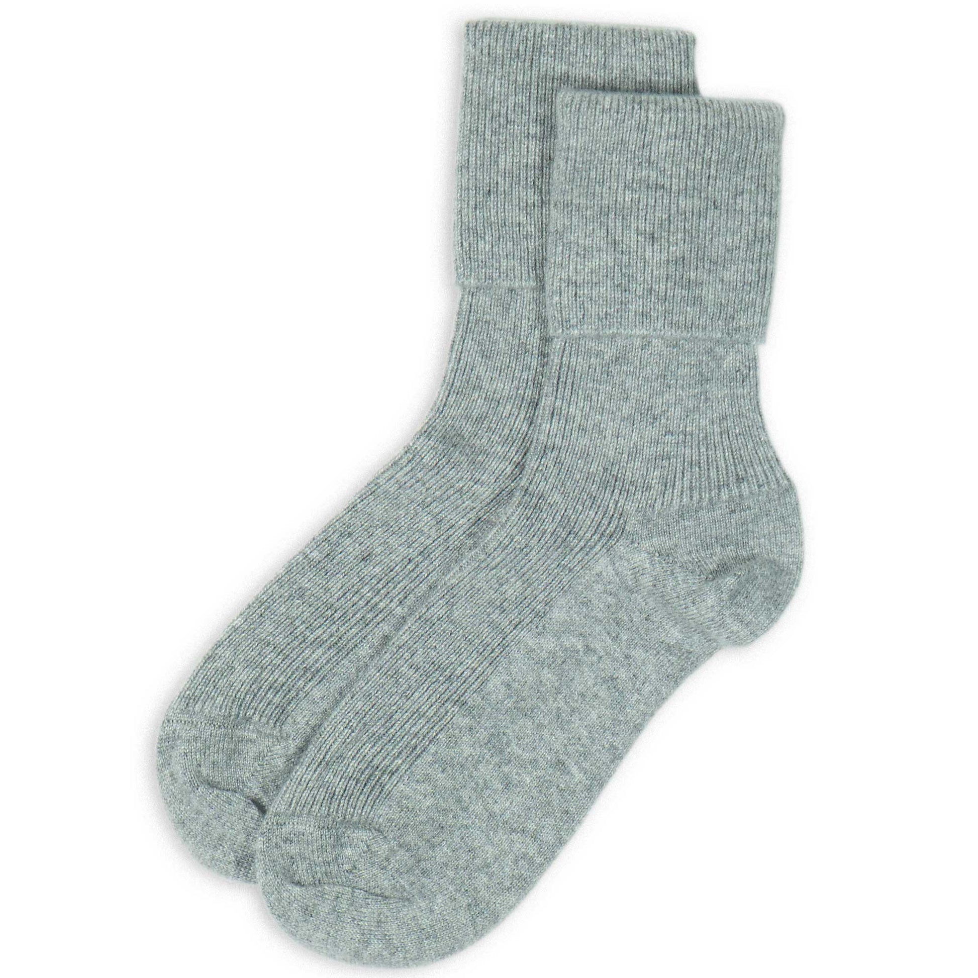 Pair of light grey ankle socks on a white background