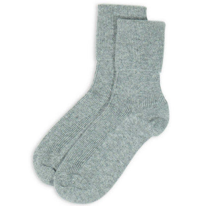 Pair of light grey ankle socks on a white background