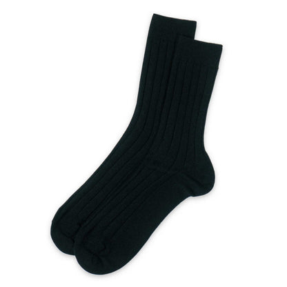 Pair of black socks on a white background