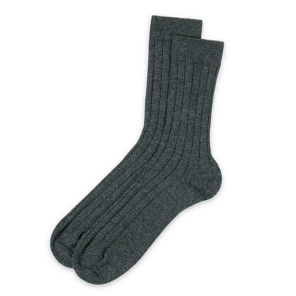 Pair of dark gray socks on a white background
