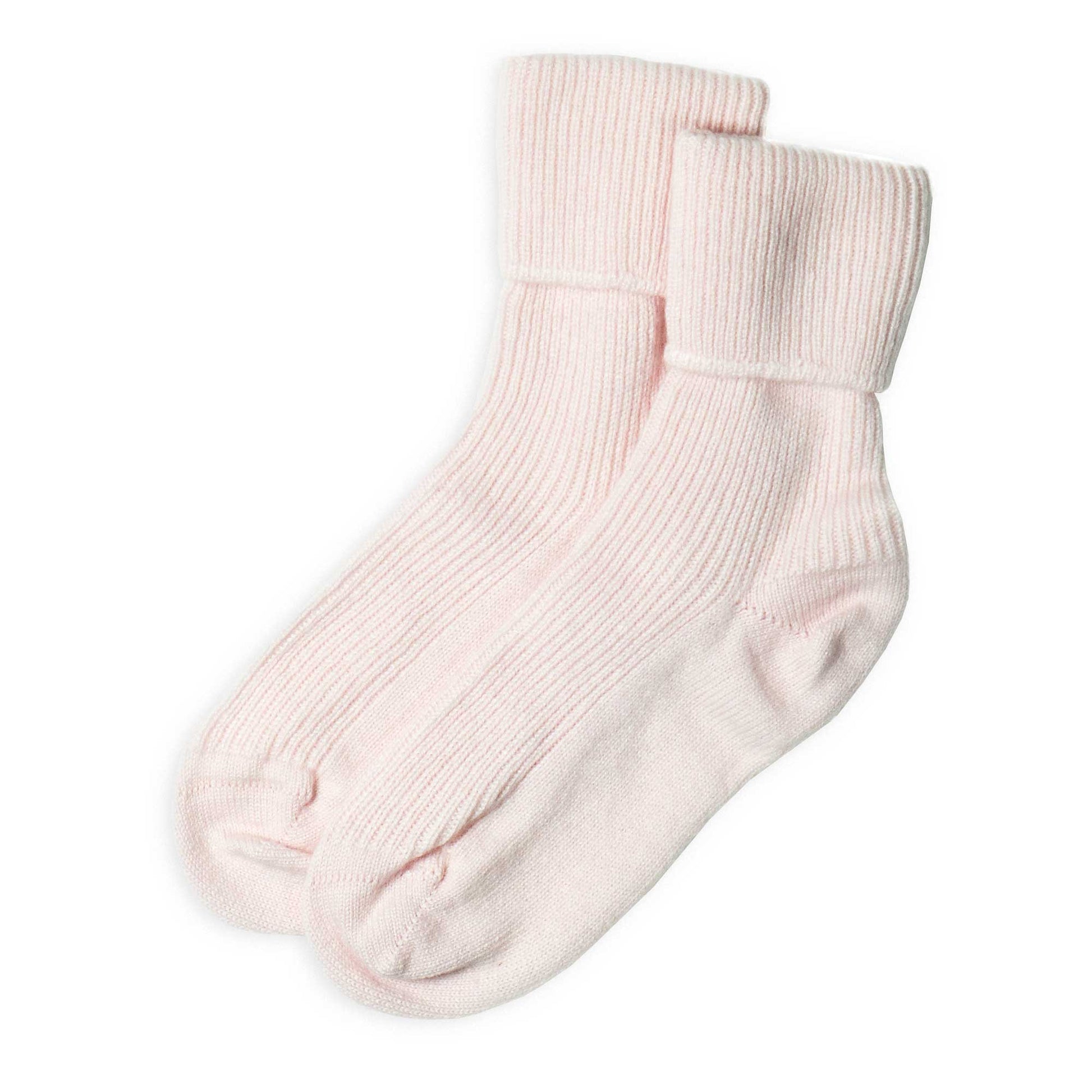 Pair of light pink cashmere socks on a white background