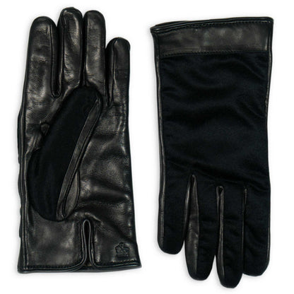 Pair of black leather gloves on a white background