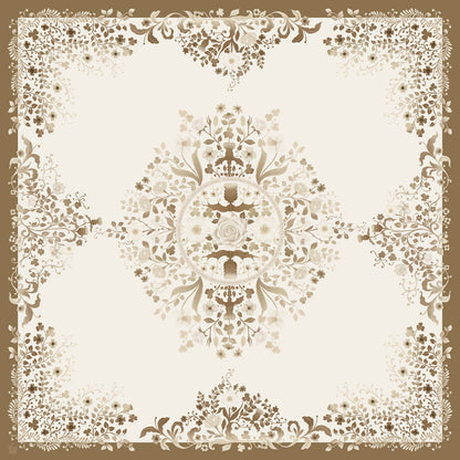 A silk scarf with a  decorative floral pattern on a gold background